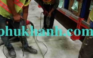 Thi công bơm vữa sika grout vào bên dưới nền bê tông nhà xưởng bị rỗng